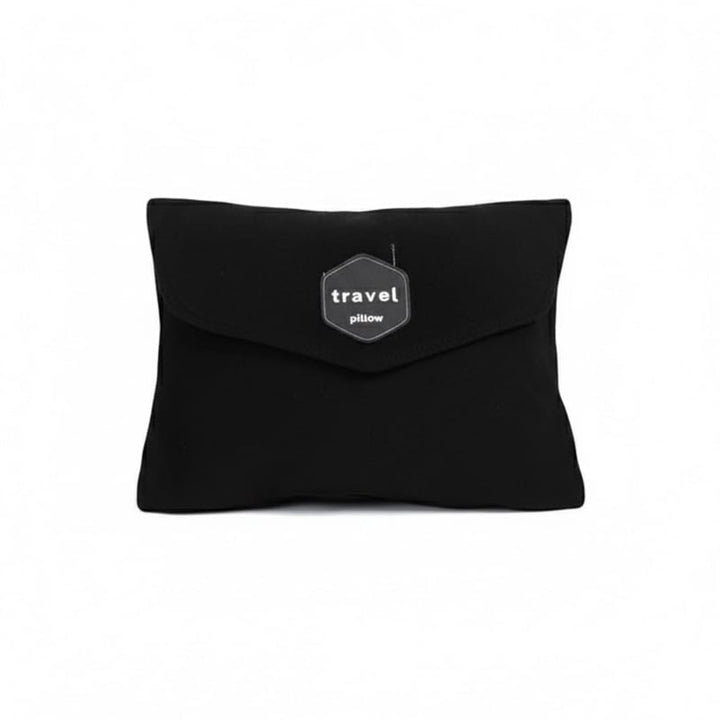 Close-up of the fabric texture on a black ergonomic travel neck pillow, emphasizing its soft and durable quality.