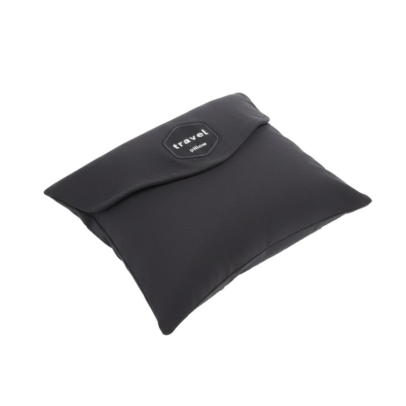 Traveler resting comfortably with a gray ergonomic travel neck pillow, demonstrating its effective neck support.