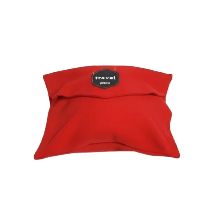 Coral red ergonomic travel neck pillow with an adjustable toggle, ensuring a perfect fit and comfort for travel.