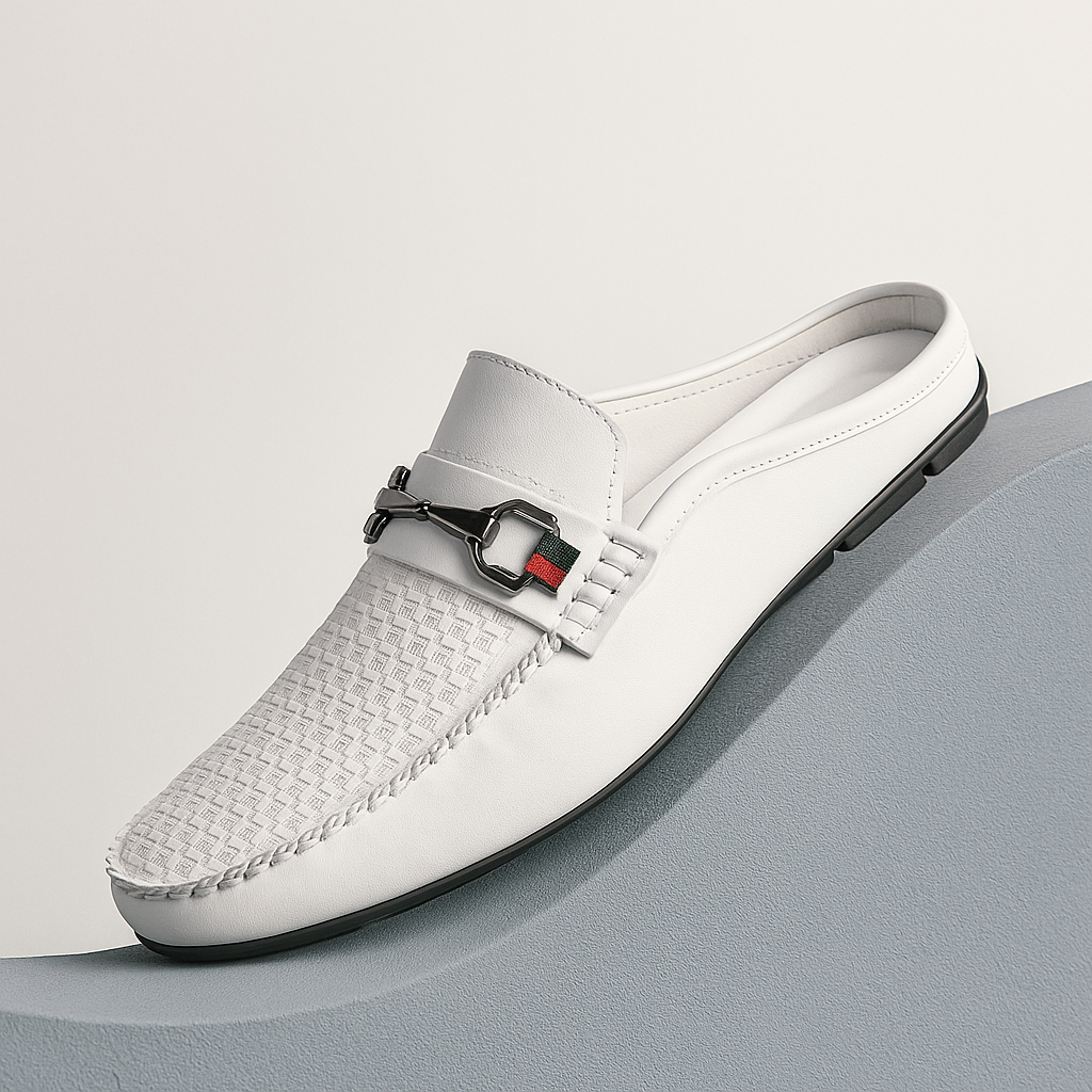 Classic black leather slip-on mules for women with a polished metal bit, versatile for any occasion.