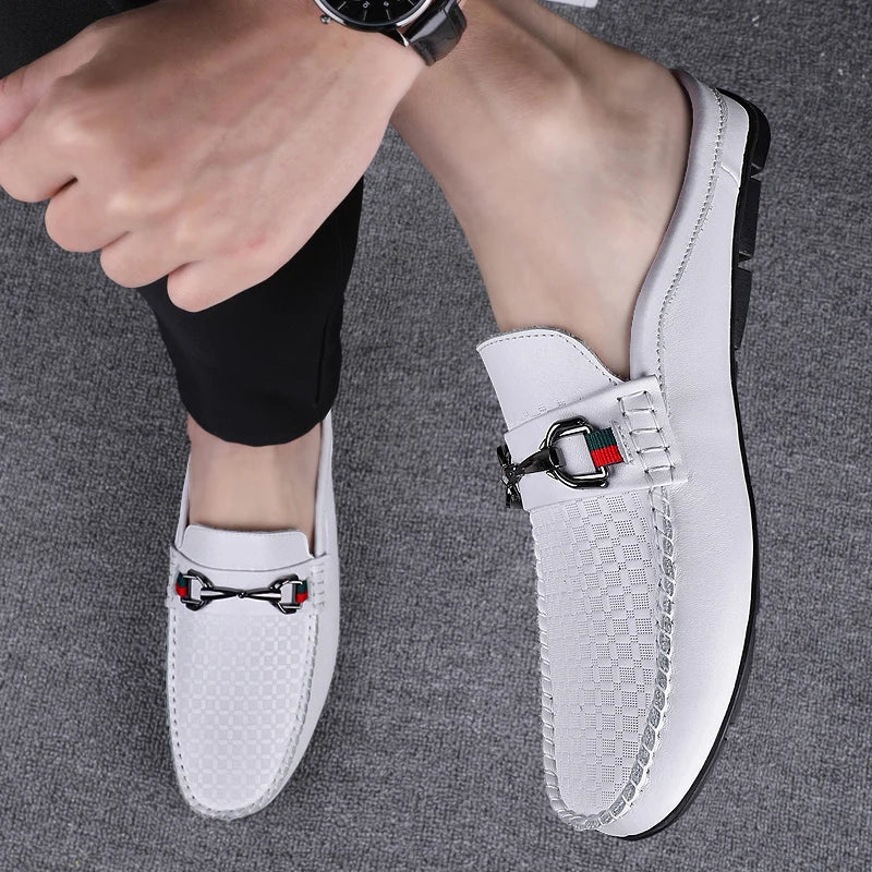Women's black leather casual mules with a metal bit, easy slip-on style for everyday comfort.