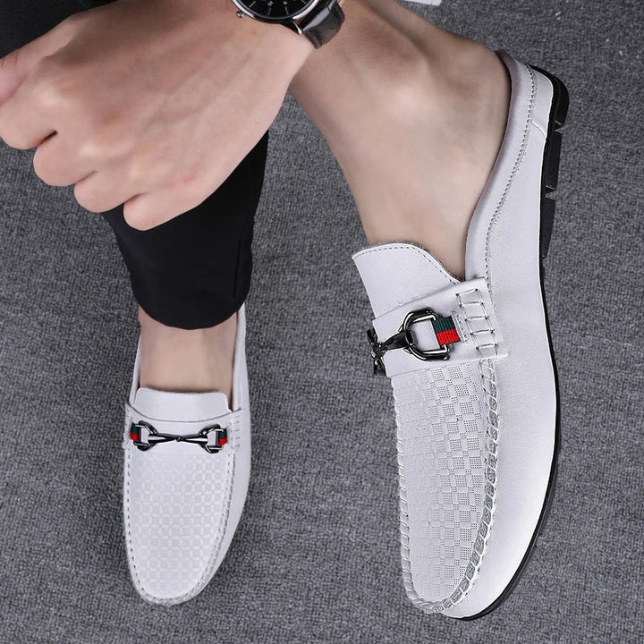 Women's black leather casual mules with a metal bit, easy slip-on style for everyday comfort.