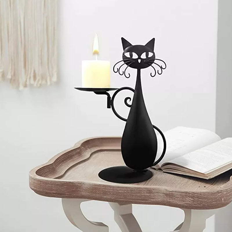 Black cat candle holder in a cozy home setting, casting beautiful shadows.
