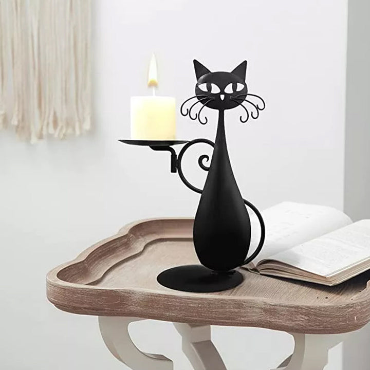 Black cat candle holder in a cozy home setting, casting beautiful shadows.