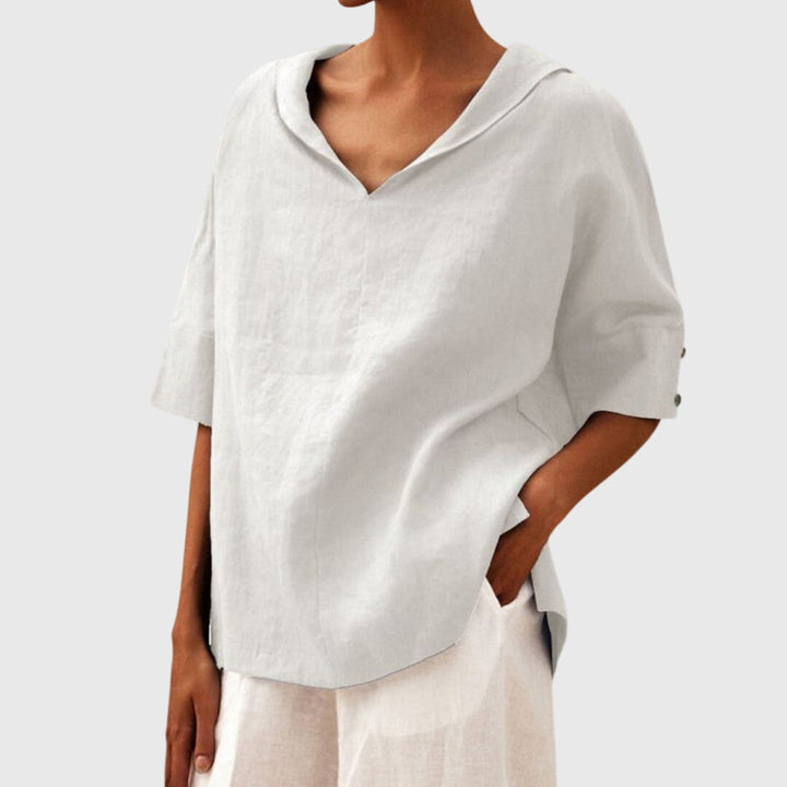 White loose fit women's blouse, versatile casual top for chic everyday wear.