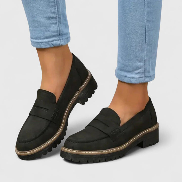 Elegant brown women's slip-on loafers, orthopedic design for all-day arch support. Comfortable casual walking shoes.