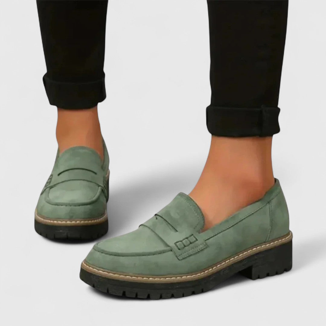 Soft women's orthopedic loafers, comfortable black slip-ons with arch support, perfect for walking & daily elegance.