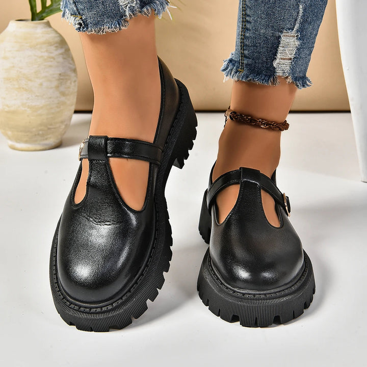 Comfortable black women's orthopedic platform Mary Jane shoes with adjustable strap.