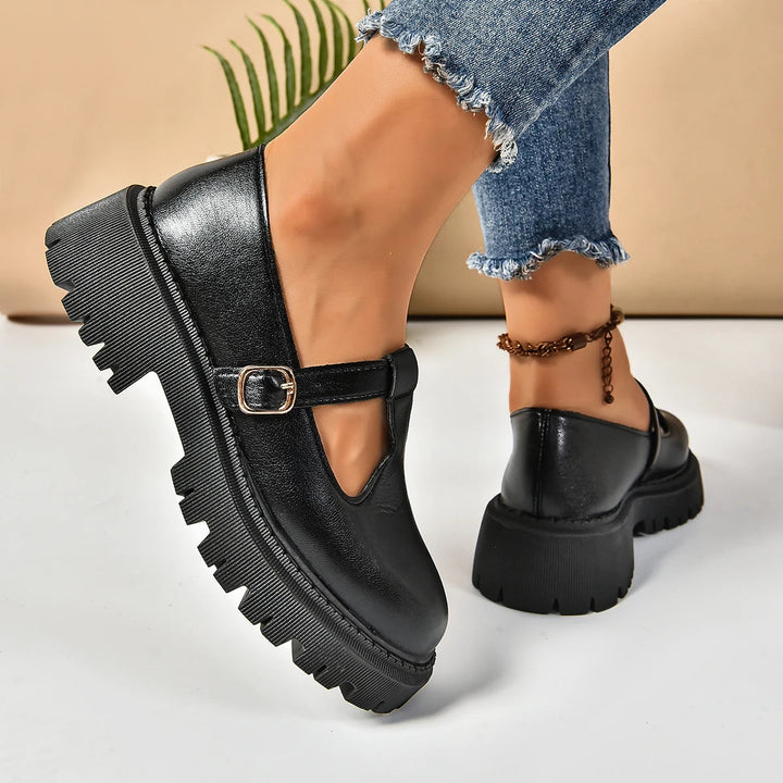 Stylish black platform Mary Jane heels for women, offering orthopedic comfort and support.