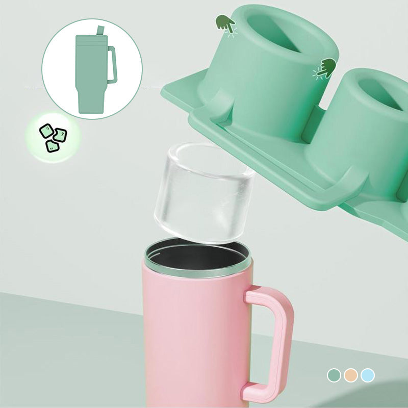 Blue silicone cylinder ice cube tray with clear lid, perfect for chilling drinks.