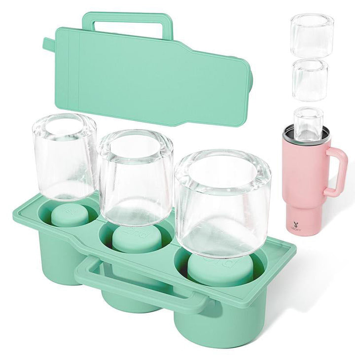 Cylinder ice cubes floating in a cocktail, made with a silicone tray.