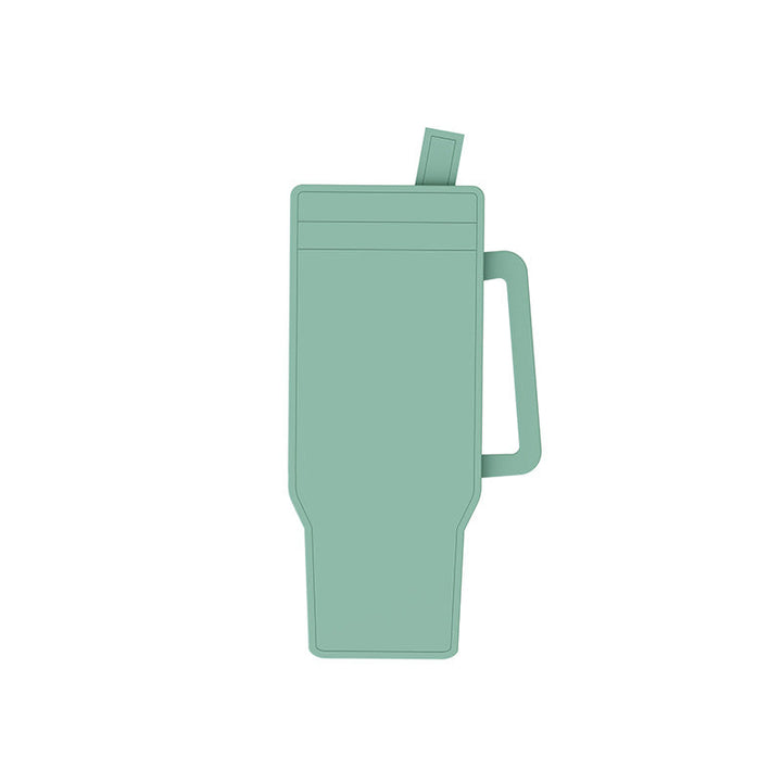 Angled view of a full silicone cylinder ice cube tray with its lid securely on.