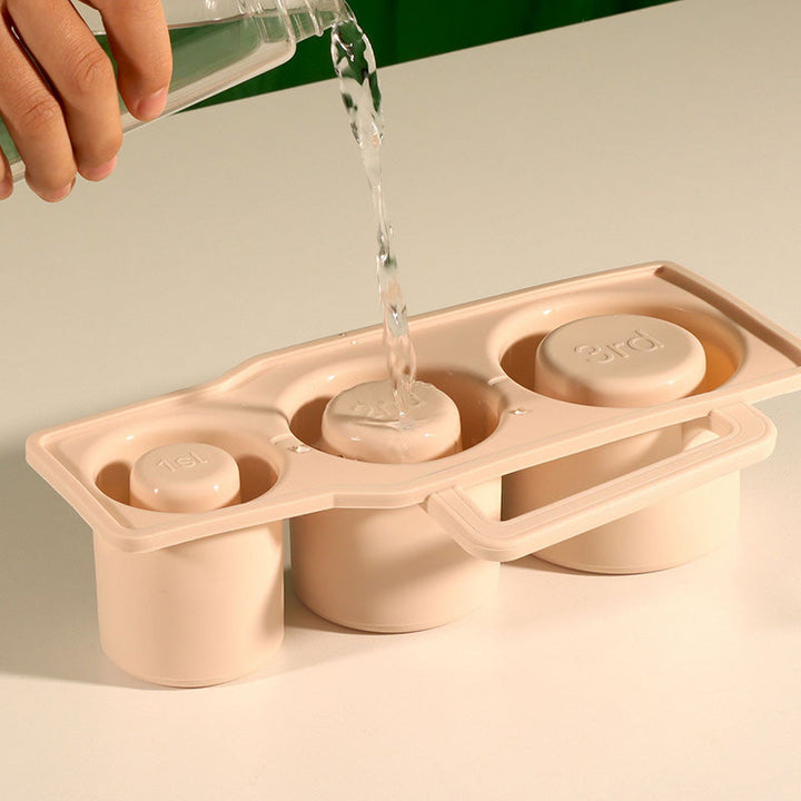 Set of two silicone cylinder ice cube trays in different colors, kitchen gadget.