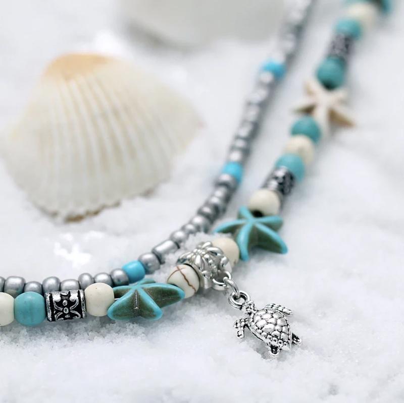 Handmade bohemian sea turtle anklet, reflecting a free-spirited and beach-loving lifestyle.