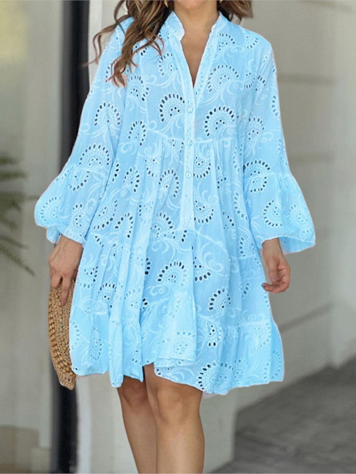 Bohemian party women's embroidered tiered mini dress. V-neck, bell sleeves, button front. Trendy summer fashion.