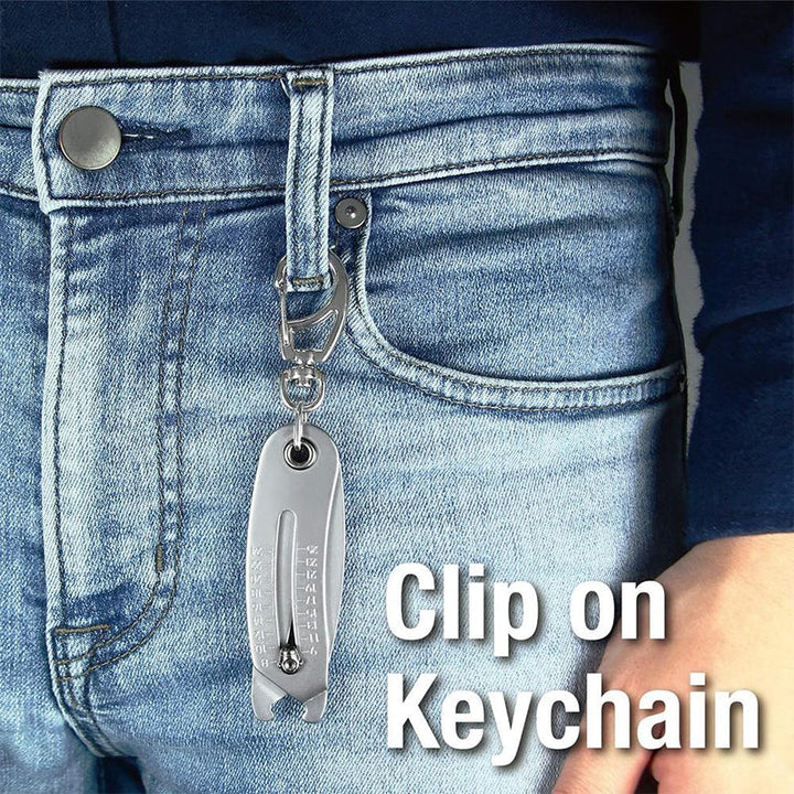 A collection of bolts and nuts with the thread checker tool beside them, for scale