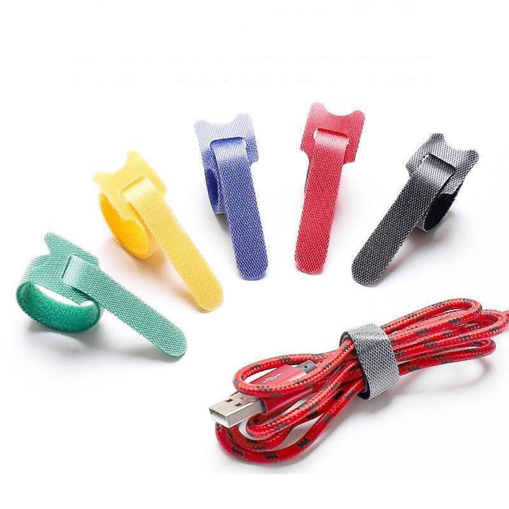 Bundle of colorful reusable cable ties for organizing wires & cords, perfect for home & office.