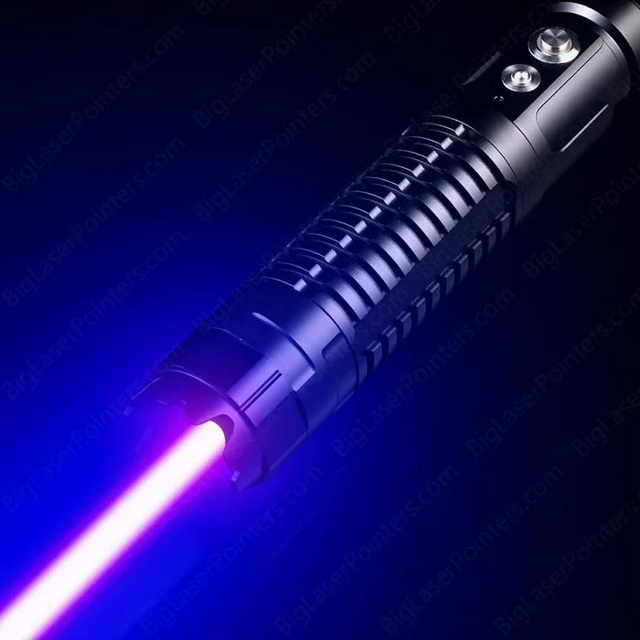 Burning blue high-power tactical laser torch for outdoor survival and fire starting.