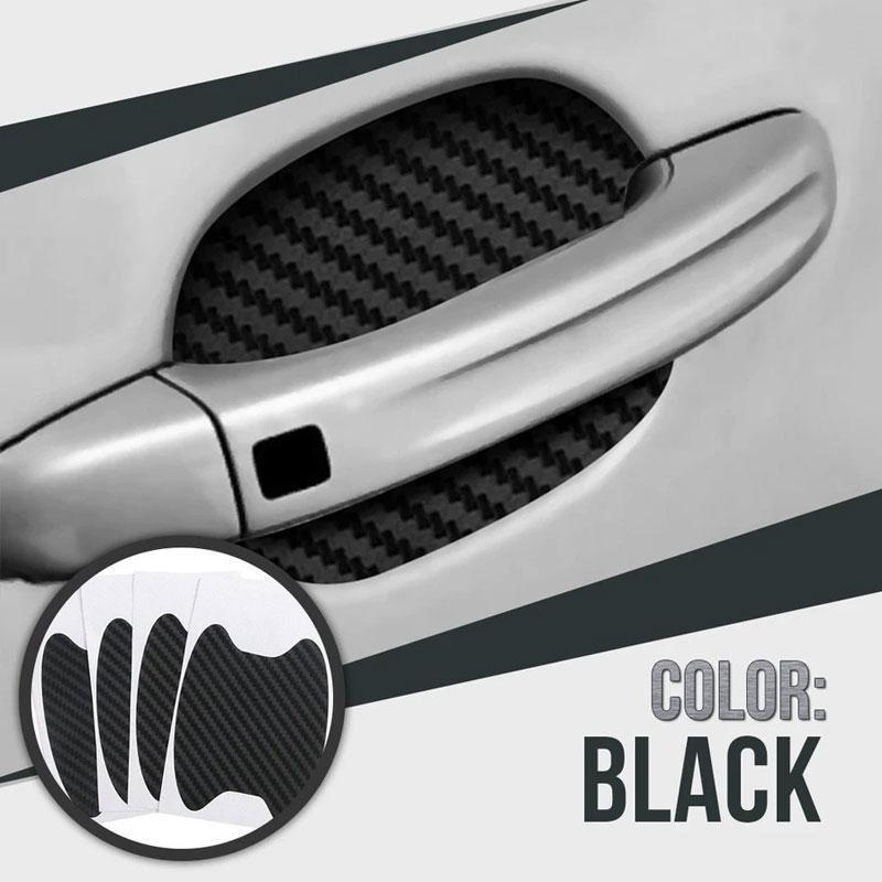 Close-up of a black carbon fiber scratch guard on a car door handle