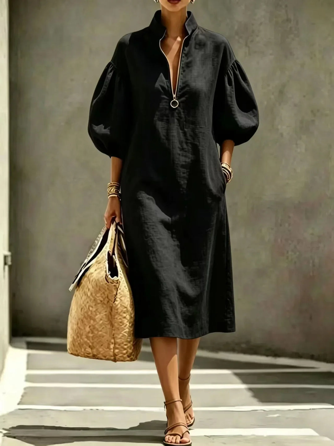 Versatile women's midi dress. Modern design with bubble sleeves & relaxed fit. Perfect for casual wear or workday style.