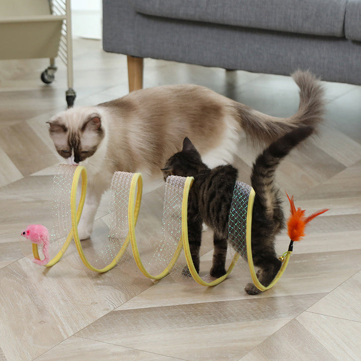 Overhead view of an interactive cat tunnel with playful feathers, showcasing its engaging design.
