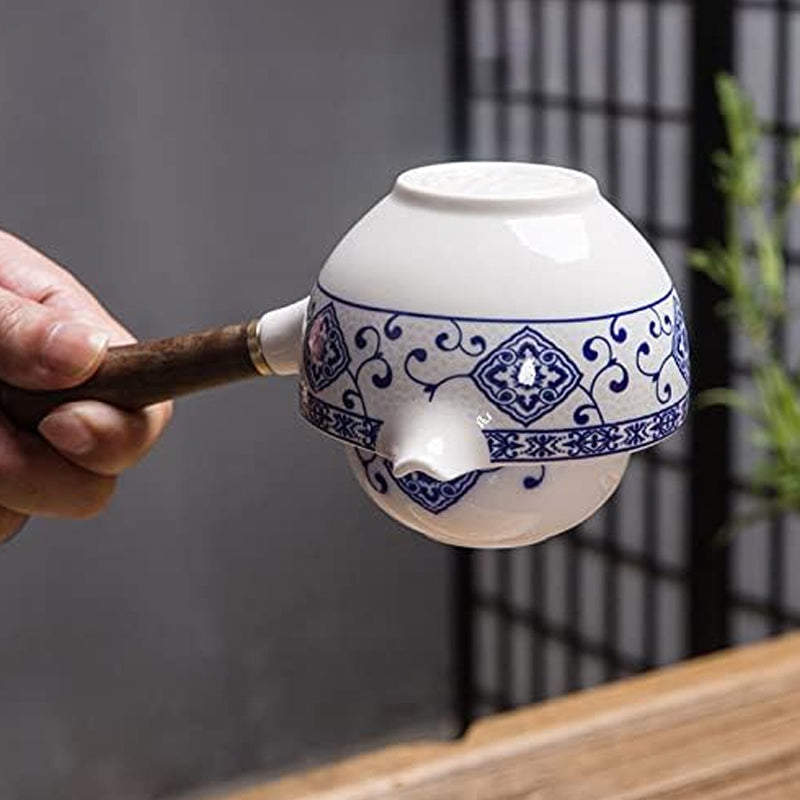 Beautiful ceramic tea set component: a 360° rotating tea maker and infuser with intricate floral details.