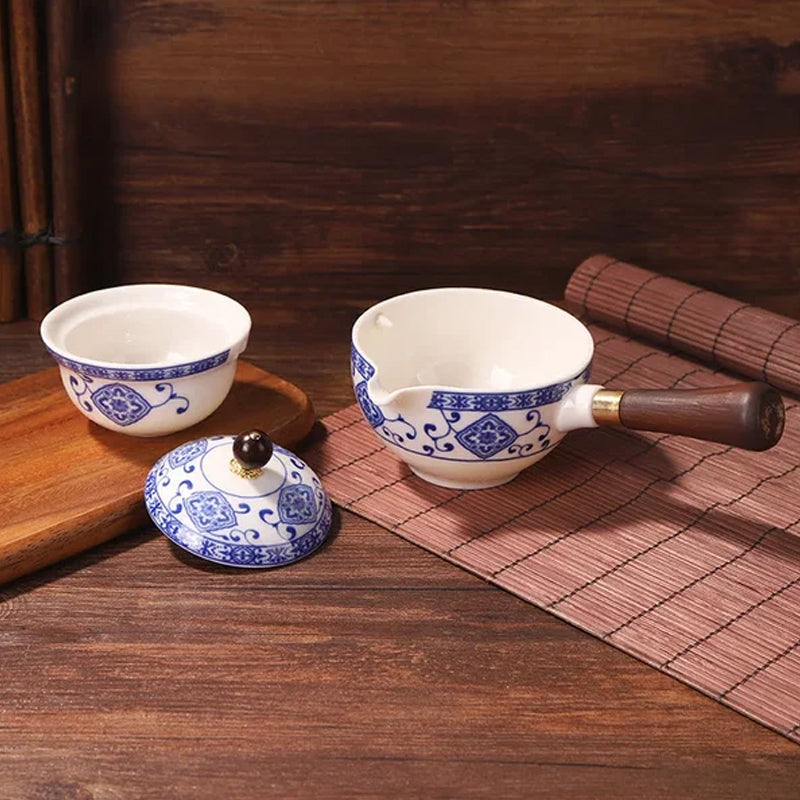 Handcrafted ceramic tea pot and infuser, showcasing beautiful floral patterns and a convenient 360° rotating base.