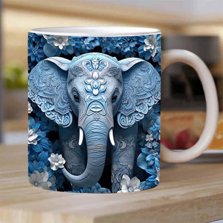 Close-up of a white ceramic mug featuring a detailed grey elephant art, ideal elephant print gift mug. Keywords: ceramicmug, animalprint.