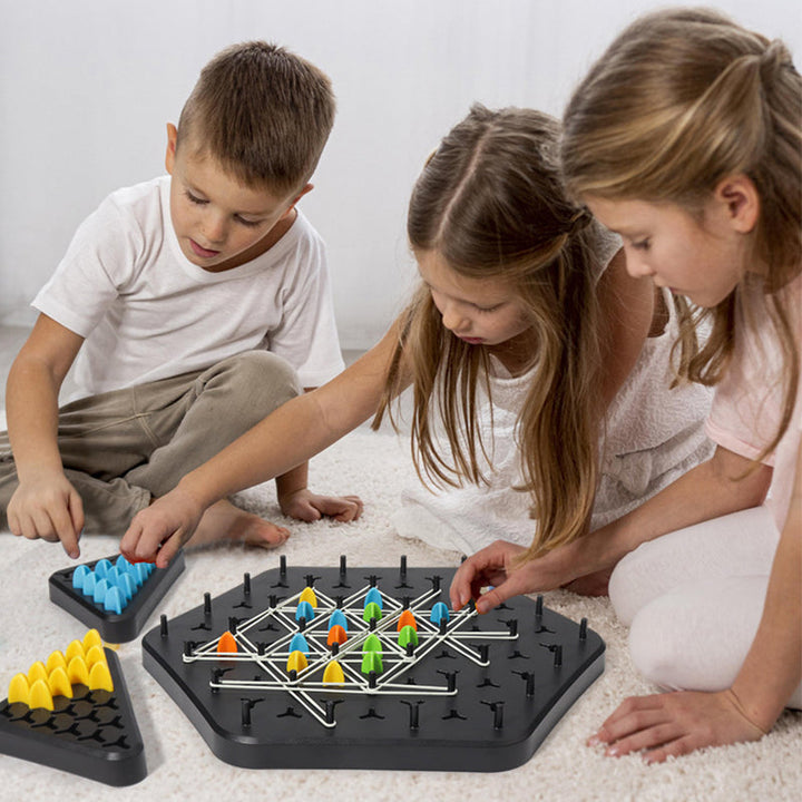 Family strategy board game, Chain Triangle Set, close-up of colorful game pieces on board
