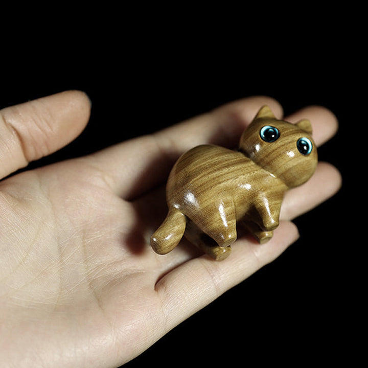 Adorable wooden cat, hand-carved figurine, a delightful animal sculpture gift