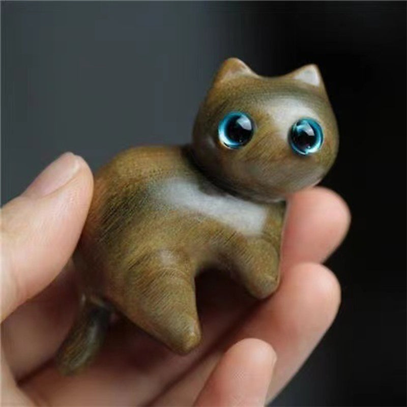 Small wooden cat statue, a charming hand-carved animal for shelves or desks