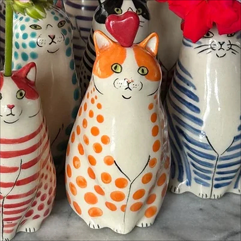 Elegant polka dot cat vase, white ceramic with black polka dots, a charming addition to home furnishings
