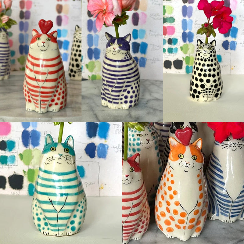 Cute ceramic cat vase with polka dots, ideal for displaying flowers or as a standalone decor piece