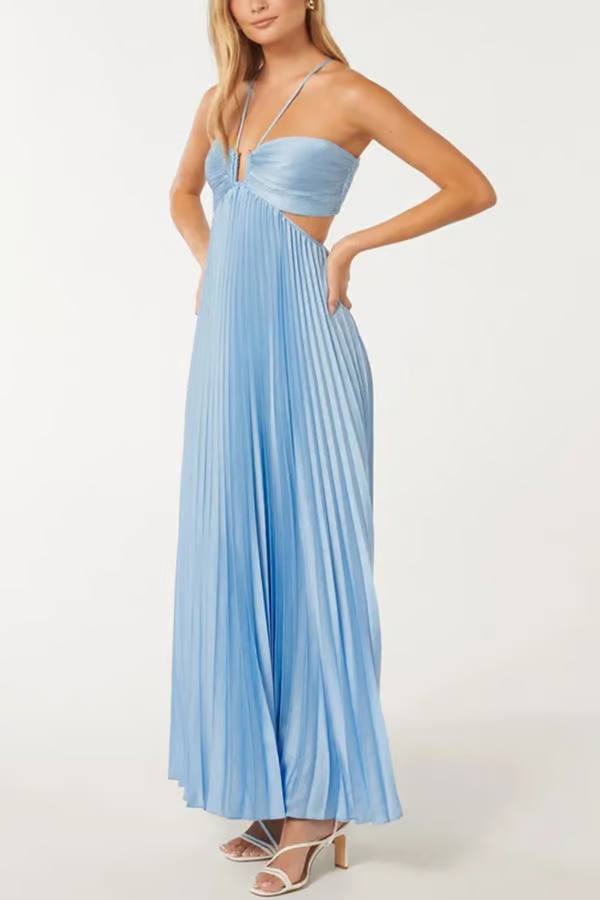 Trendy women's blue pleated maxi dress with a modern cutout, great for a stylish wedding guest look.