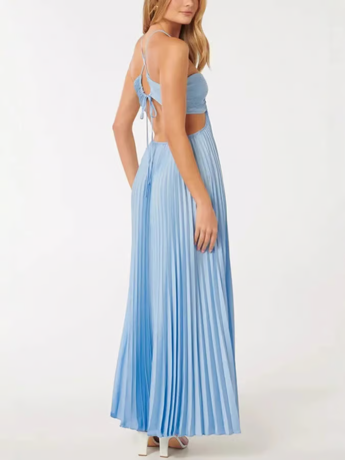 Flowing blue pleated maxi wedding guest dress with a chic cutout, perfect for elegant summer parties.