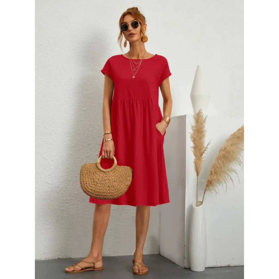 Chic women's A-line midi dress with cap sleeves & pockets, perfect for versatile summer fashion.