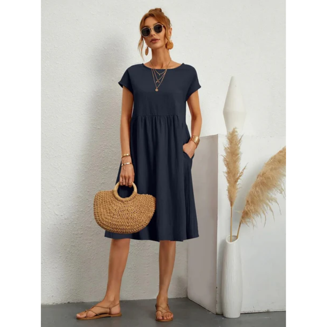 Easy wear women's midi dress: A-line silhouette, cap sleeves, and pockets combine comfort with summer style.
