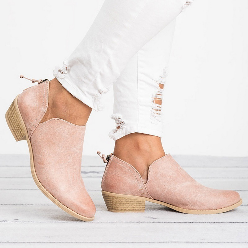 Versatile women's fashion ankle boots with a trendy low block heel, ideal for casual or everyday wear.