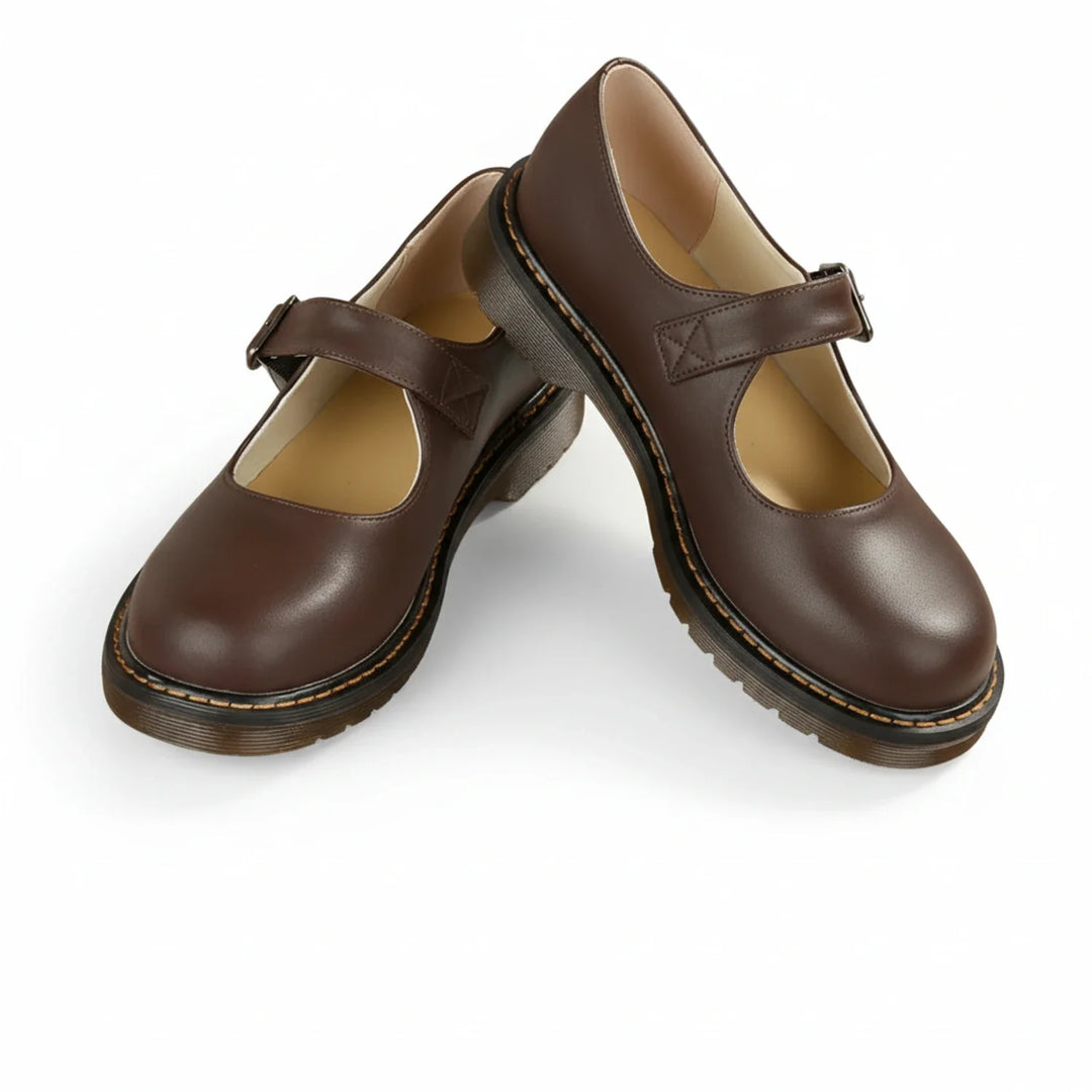 Chic women's black platform Mary Jane shoes with buckle strap, round toe, and lug sole. Perfect vintage style fashion heels.