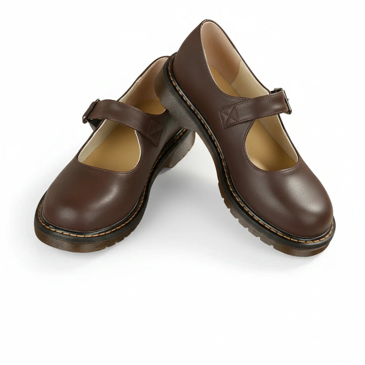 Chic women's black platform Mary Jane shoes with buckle strap, round toe, and lug sole. Perfect vintage style fashion heels.