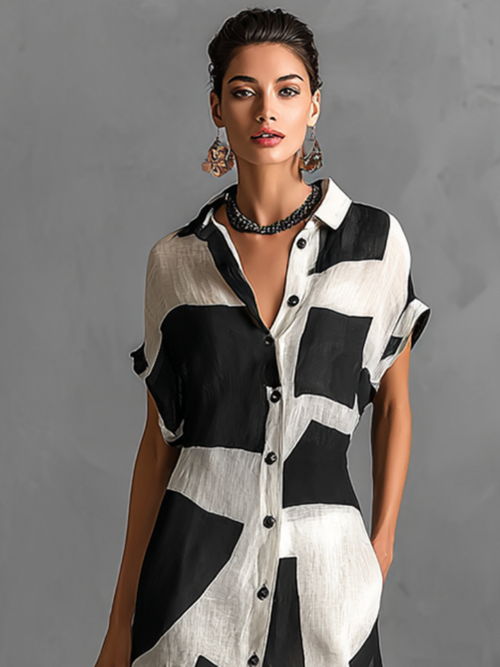 Casual women's short sleeve black & white color block maxi dress, ideal for warm weather and everyday style.