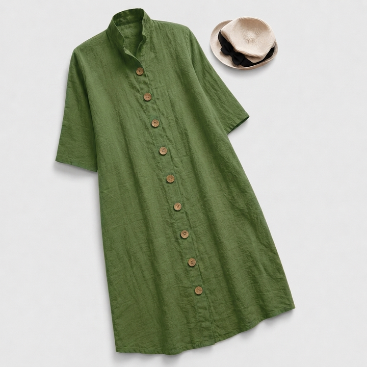 Modern women's button-down midi dress with a chic layered hem, a versatile and comfortable shirt dress.