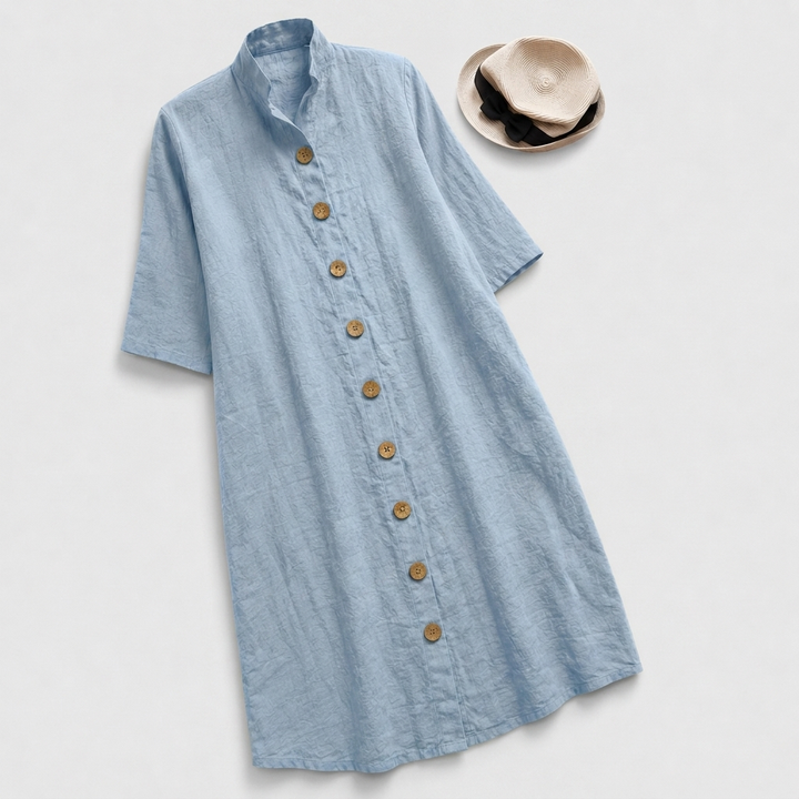 Stylish women's button-down dress featuring a unique layered midi hem. A versatile, chic, and modern shirt dress.