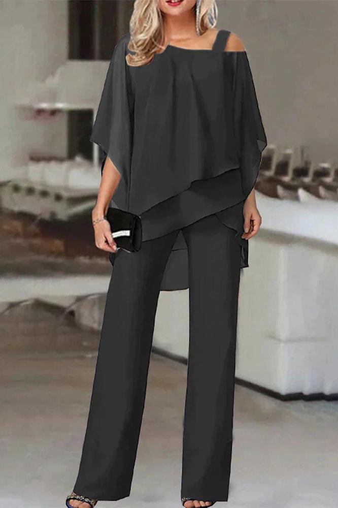 Soft & comfortable women's blouse and pants set. Relaxed fit two-piece outfit perfect for all-day wear.
