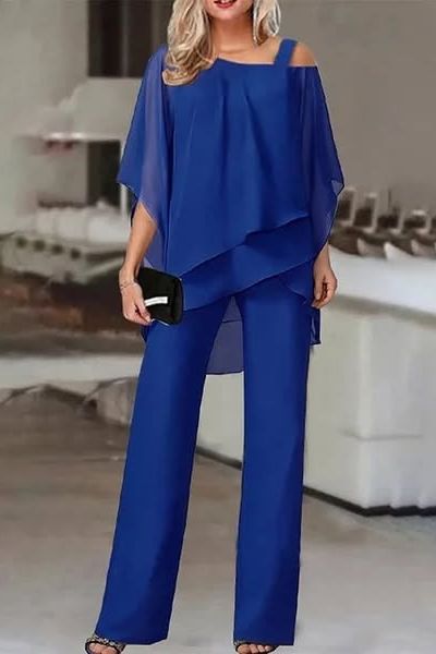 Elegant women's matching blouse and pants set, ideal for sophisticated office wear or smart casual occasions.