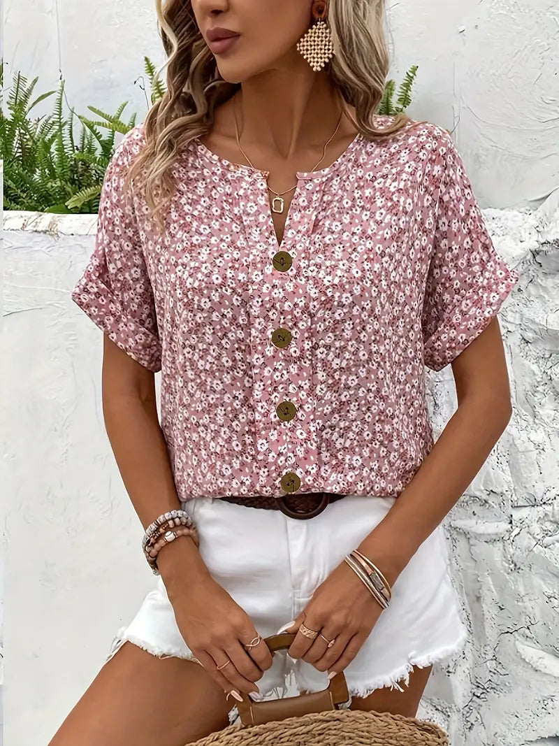 Beautiful floral print women's button blouse, offering effortless chic style. Perfect elegant casual wear.