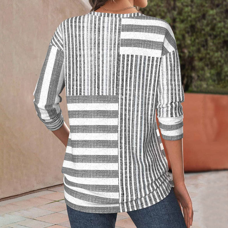 Versatile gray panel striped women's blouse with three-quarter sleeves & round neck, ideal for casual or office fashion.