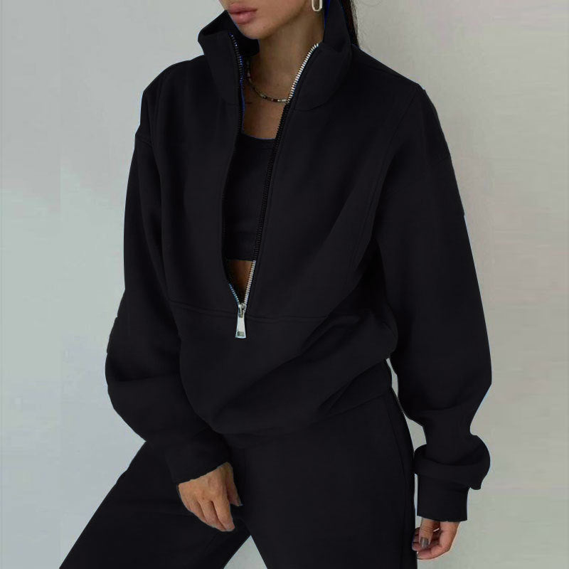 Soft, oversized women's half-zip pullover & jogger set. Stylish two-piece loungewear for ultimate comfort.