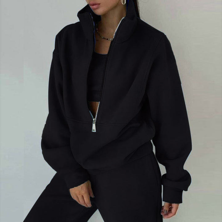 Soft, oversized women's half-zip pullover & jogger set. Stylish two-piece loungewear for ultimate comfort.