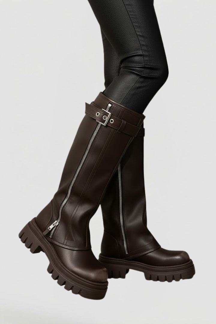 Fashionable women's knee-high platform boots, offering a tall silhouette and elevated style.